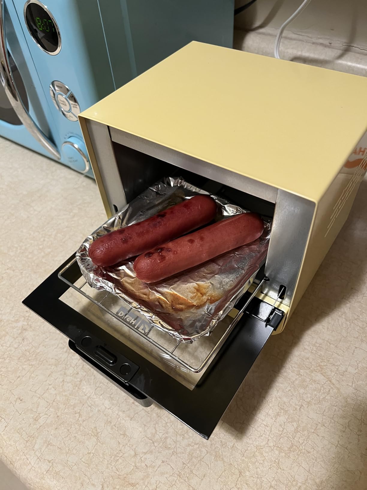 Dash Mini Toaster Oven - Sleek & Stylish - For Creative Homemade Treats - Compact, Space-Saving Design - Adjustable Temperature Dial - Removable Baking Tray - Aqua customer photo 2