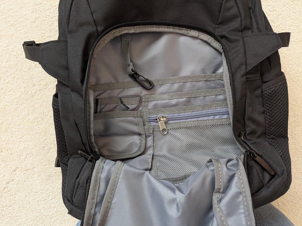 Amazon Basics Travel Laptop Backpack with Multiple Pockets and Compartments for 17 in / 43.1 cm Laptop, Water Resistant, Spacious with Padded Shoulder Straps, Black customer photo 2