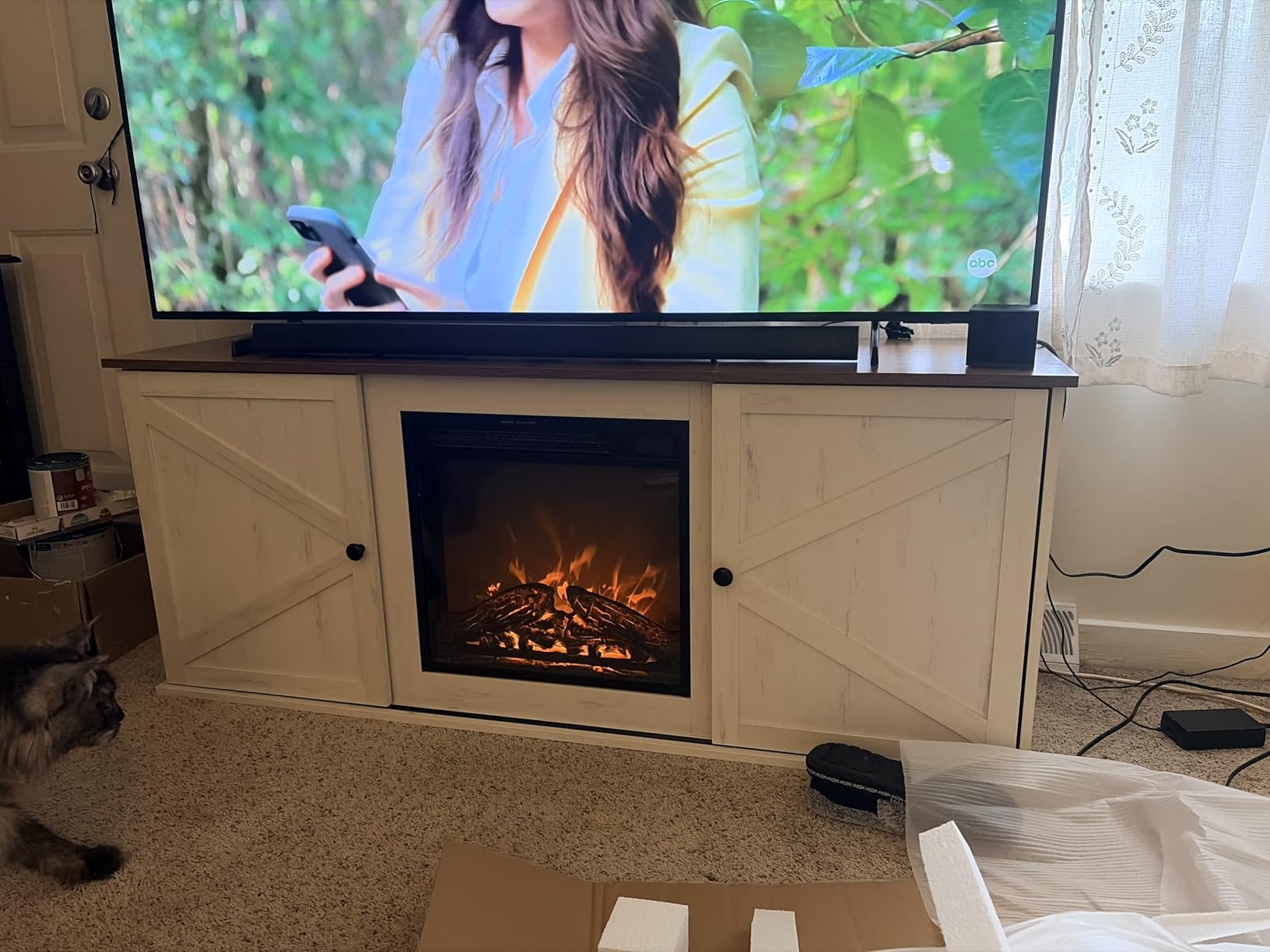 VASAGLE Farmhouse TV Stand for 65 Inch TVs with Storage Cabinets and Sliding Barn Doors customer photo 1