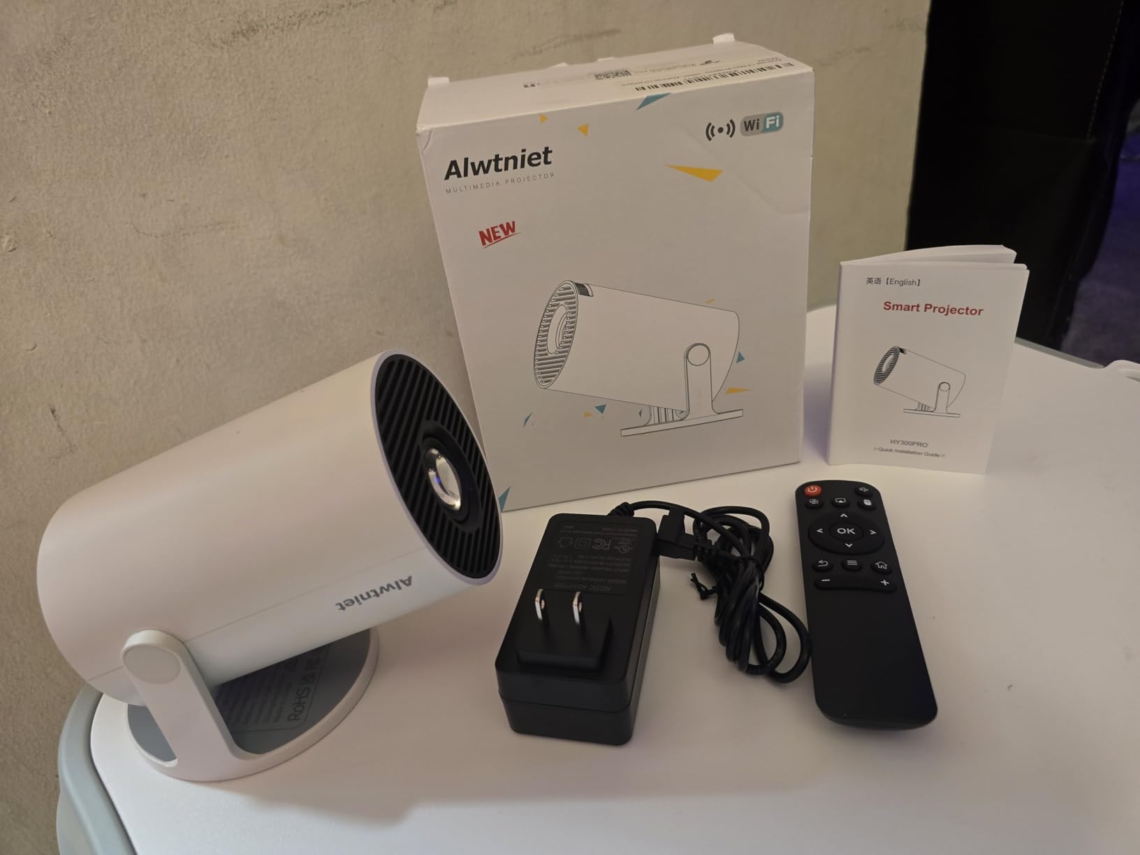 Mini Projector with WiFi 6 and Bluetooth 5.4, 4K Supported Portable Projector, Android 14 Smart Proyector with 200 ANSI & Auto Keystone, Alwtniet HY300Pro Small Projector for Bedroom, Movie, Outdoor customer photo 1