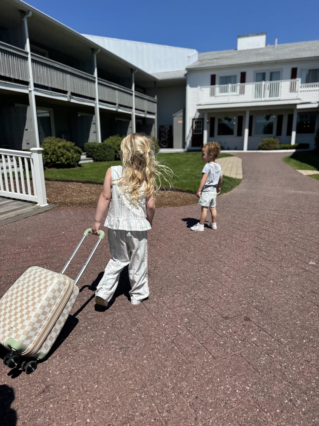 Itzy Ritzy Toddler Suitcase with Adjustable Handle, 360-Degree Spinner Wheels, 2 Interior Compartments and Hard Shell Design - Strawberry customer photo 1