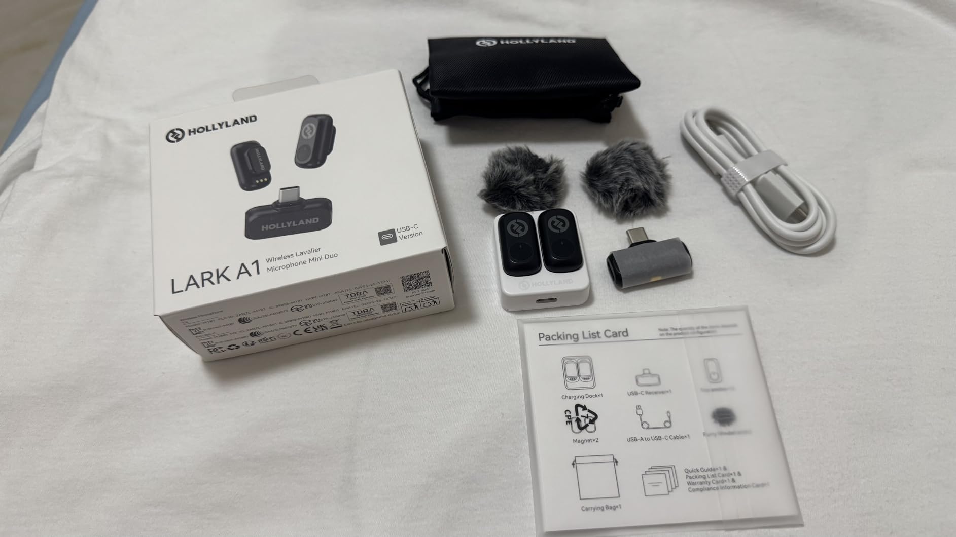 Hollyland Lark A1 Wireless Microphone for iPhone & Android, 48kHz/24-bit Studio Audio, 3-Level Noise Cancellation, 200m Range, Magnetic Mini Mic for Video Recording & Live Streaming (2TX + USB-C RX) customer photo 1