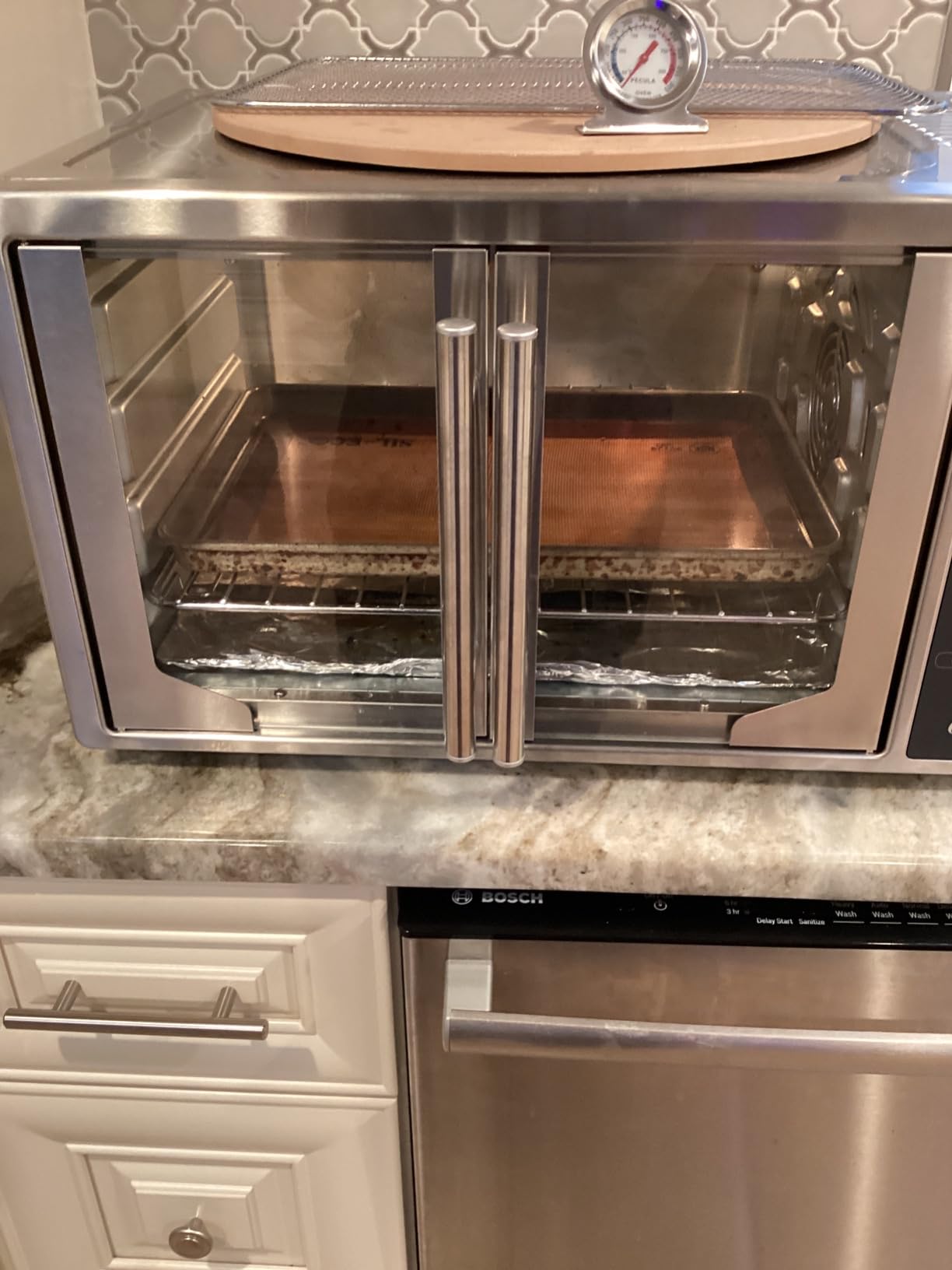Oster Extra Large 42L French Door Countertop Toaster Oven, 10-in-1 Air Fryer Oven, with Air Fry Rack, Wire Rack, Baking Pan and Crumb Tray, Stainless Steel customer photo 1