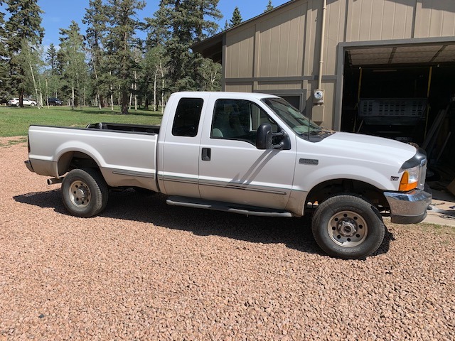 Tyger Auto Fender Flares Compatible with 1999-2007 Ford F-250 F-350 Super Duty, Smooth Textured Paintable Bolt-Riveted Style 4pc | TG-FF8F4098 customer photo 1