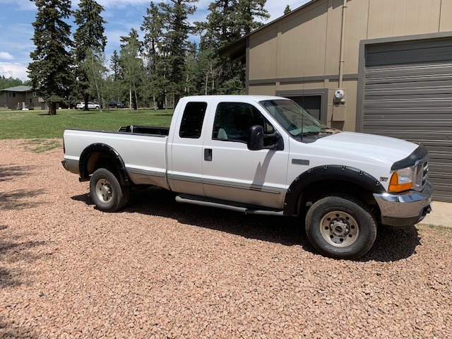 Tyger Auto Fender Flares Compatible with 1999-2007 Ford F-250 F-350 Super Duty, Smooth Textured Paintable Bolt-Riveted Style 4pc | TG-FF8F4098 customer photo 2