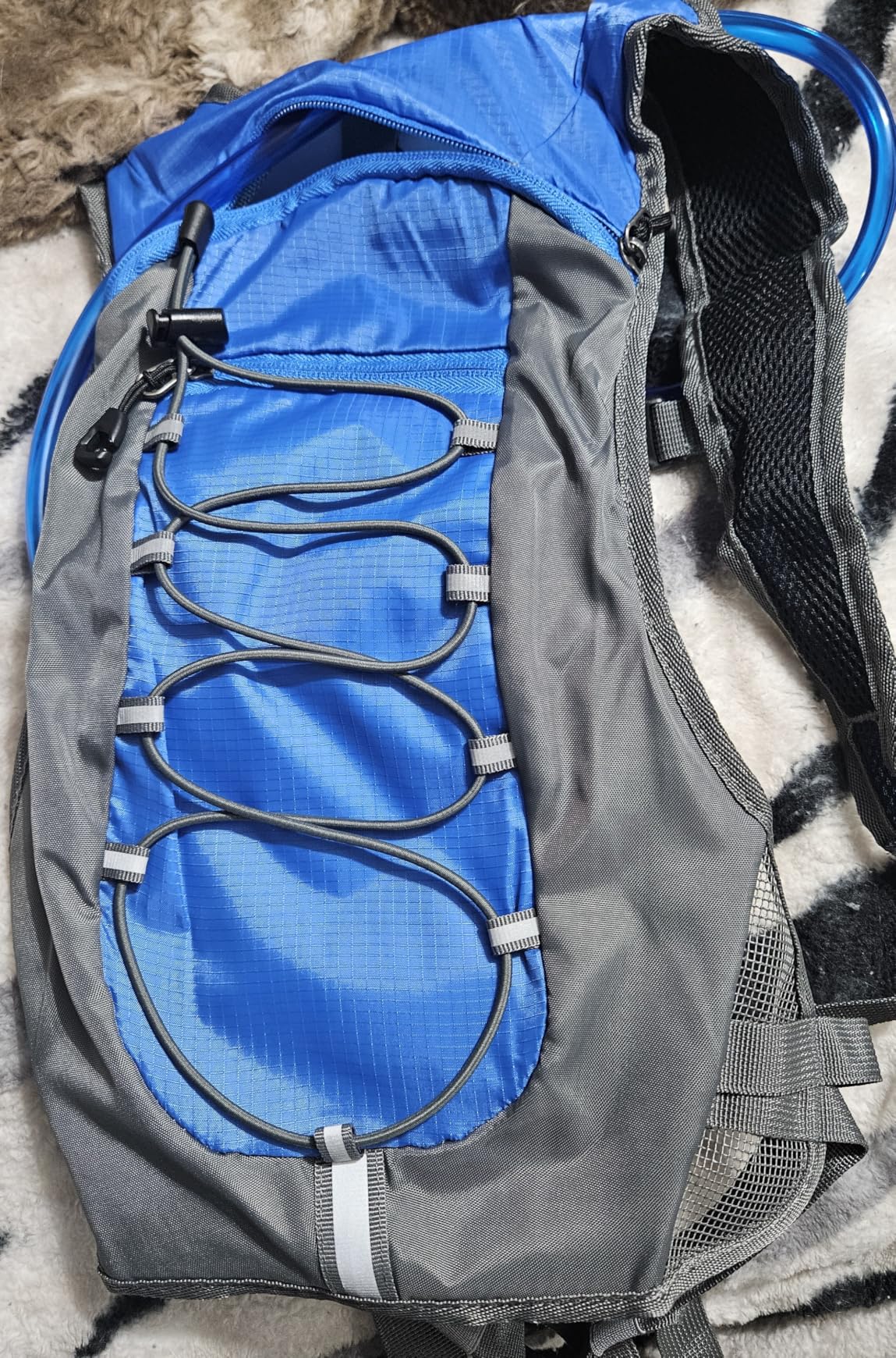 Unigear Hydration Pack Backpack with 70 oz 2L Water Bladder for Running, Hiking, Cycling, Climbing, Camping, Biking customer photo 2