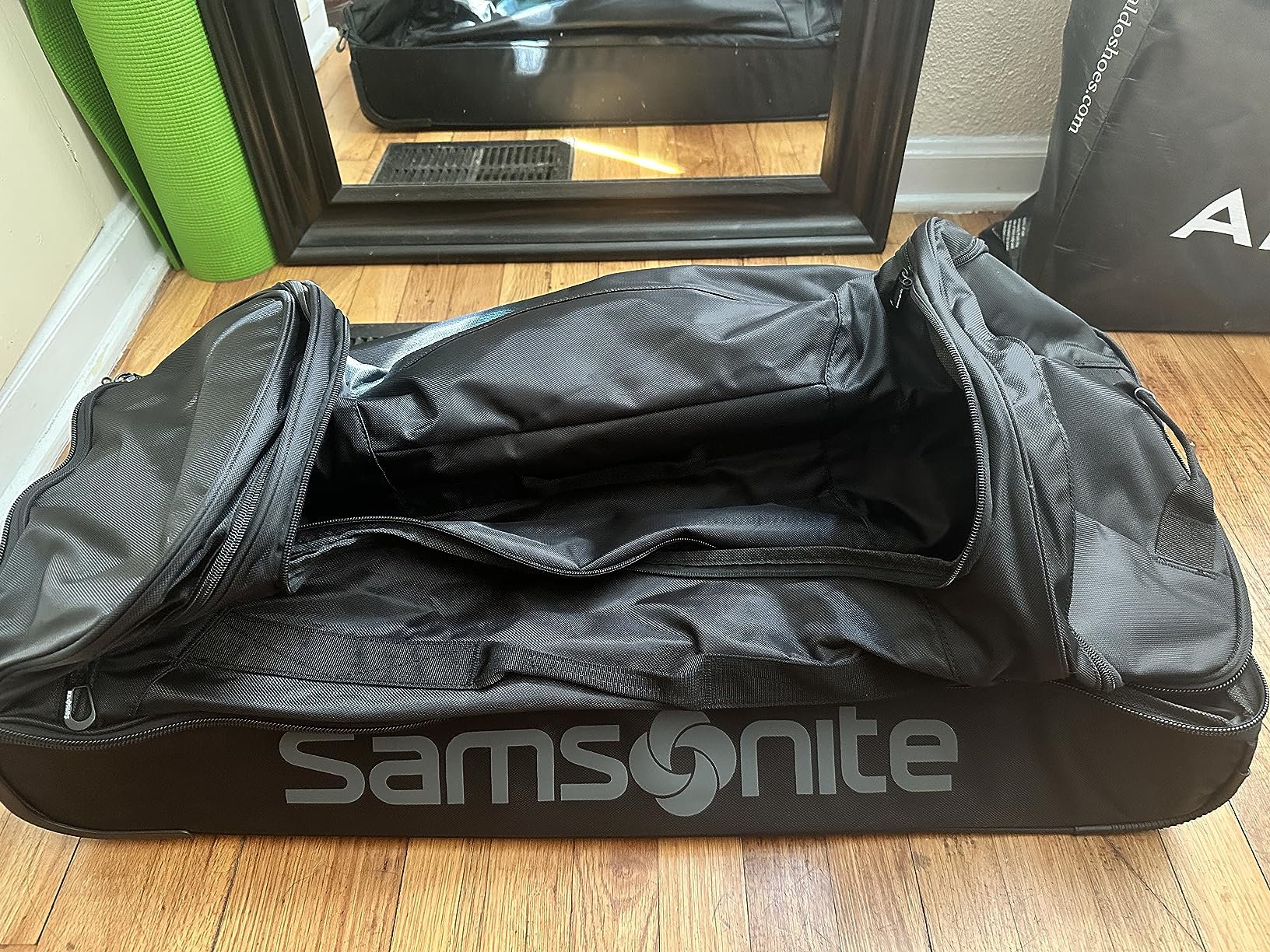 Samsonite Andante 2 Wheeled Duffel Bag - 22-Inch Durable Rolling Luggage with Inline Skate Wheels, Push-Button Handle & Spacious Compartments - Travel-Friendly and Lightweight - All Black customer photo 1