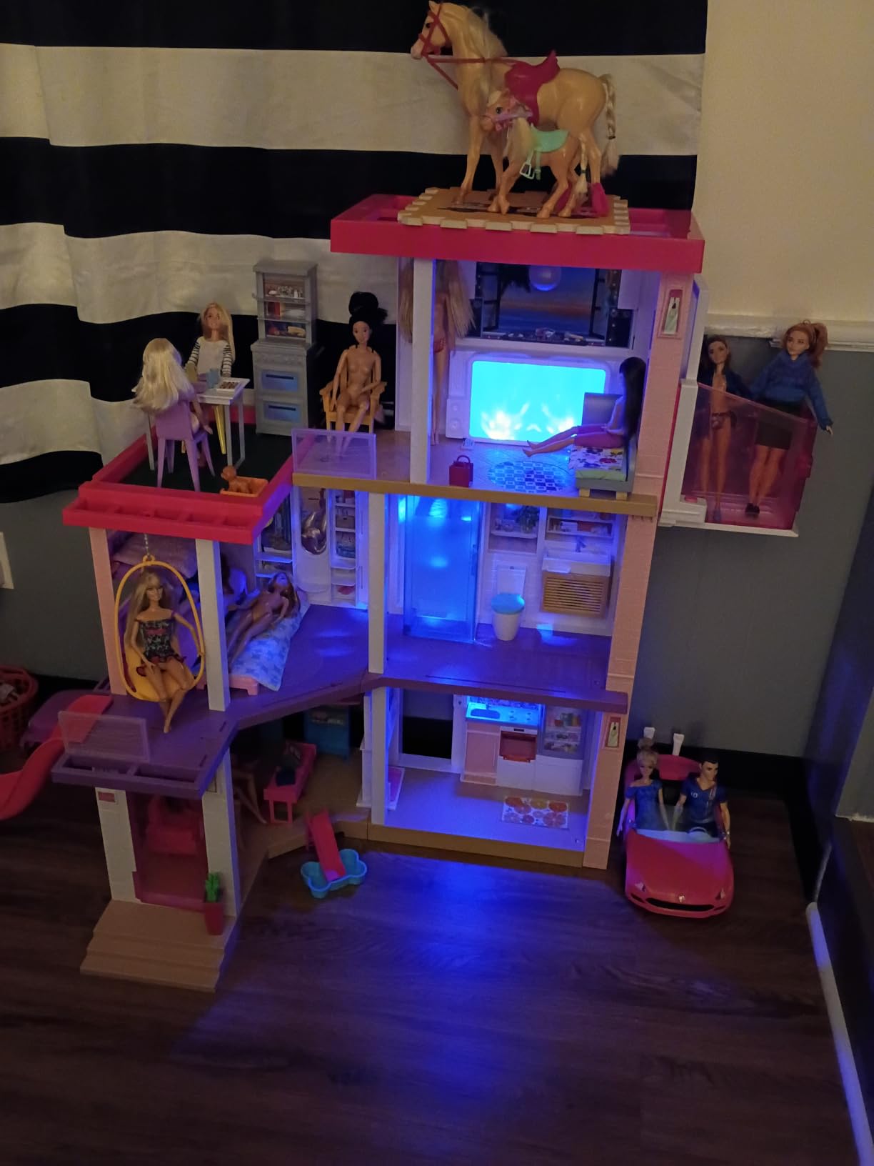 Barbie Dreamhouse (3.75-ft) 3-Story Dollhouse Playset with Pool & Slide, Party Room, Elevator, Puppy Play Area, Customizable Lights & Sounds, 75+ Pieces, Gift for 3 to 7 Year Olds customer photo 1