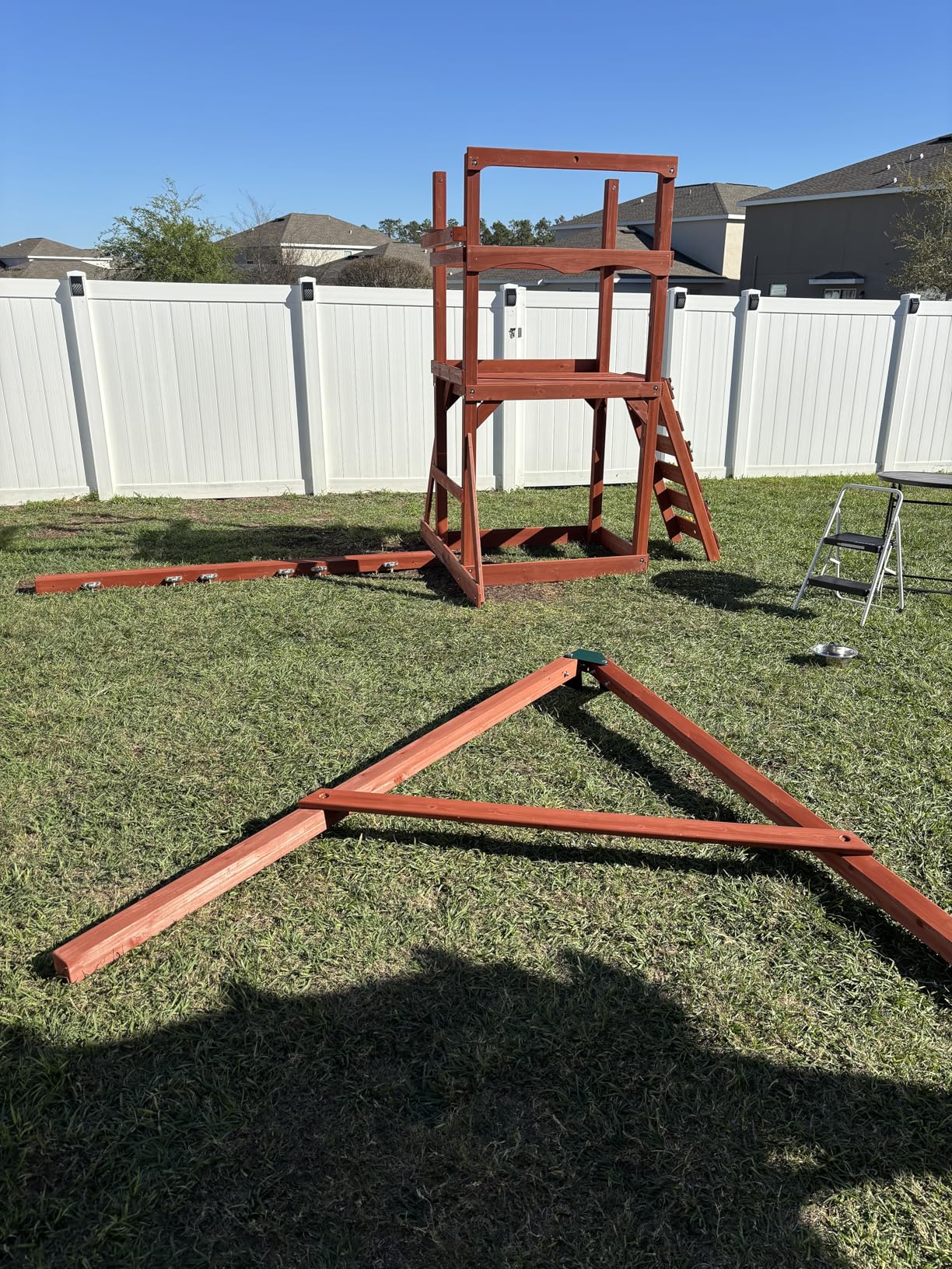 01-1057-GREY Playmaker Deluxe Wooden Swing Set with Dual Gray Wave Slides, Vinyl Canopy Roof, Swings, and Rock Climbing Wall, Redwood Stained Cedar (Amazon Exclusive) customer photo 2