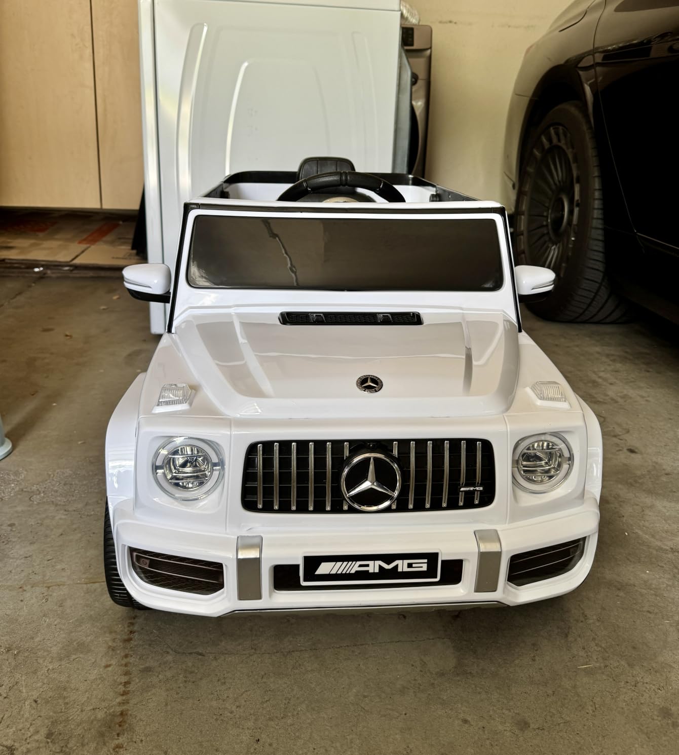 ELEMARA Licensed Mercedes-Benz AMG G63 Ride on Toys, Electric Car for Kids W/Parents Control, Electric Powered G Wagon Ride On Truck Toy, Low Battery Prompt, Bluetooth, Flickering Lights/LED Lights, White customer photo 1