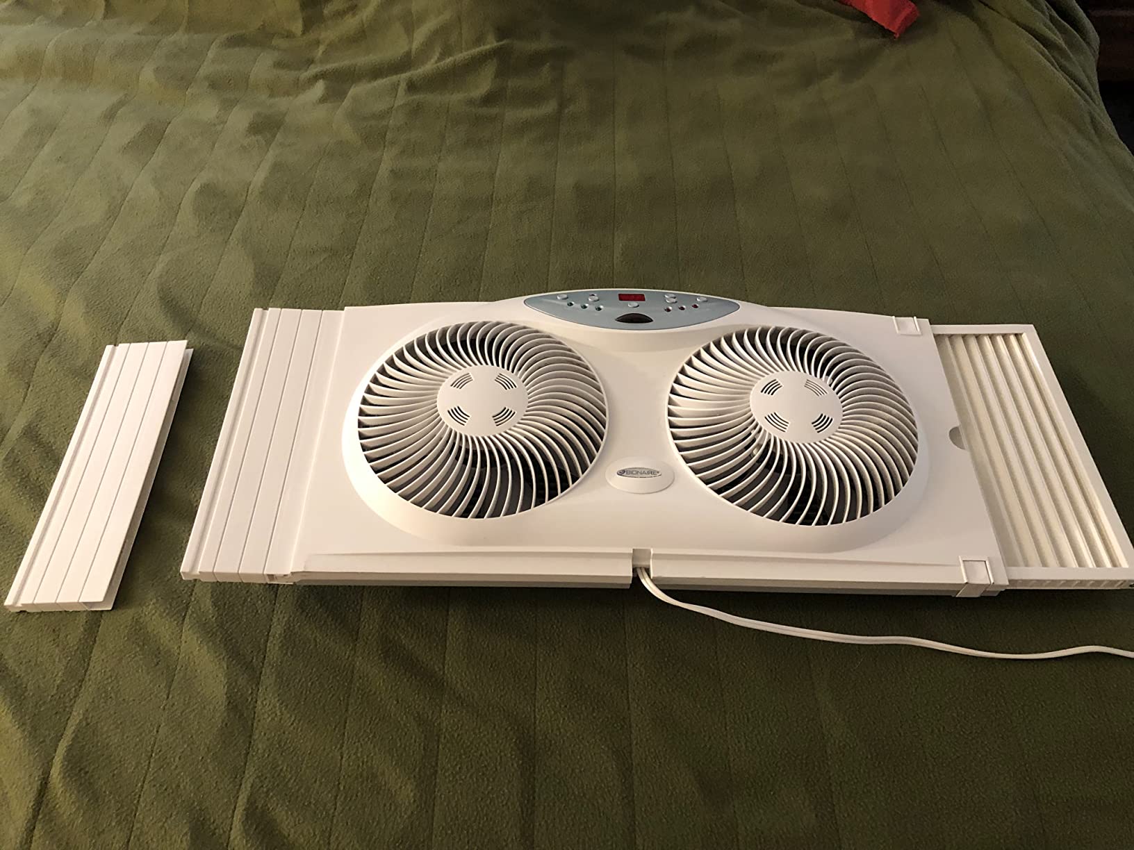 Bionaire Window Fan with Reversible Airflow Blades - 3-Speed Settings, Programmable Thermostat, LED Display, Remote Control, Fits 24-36