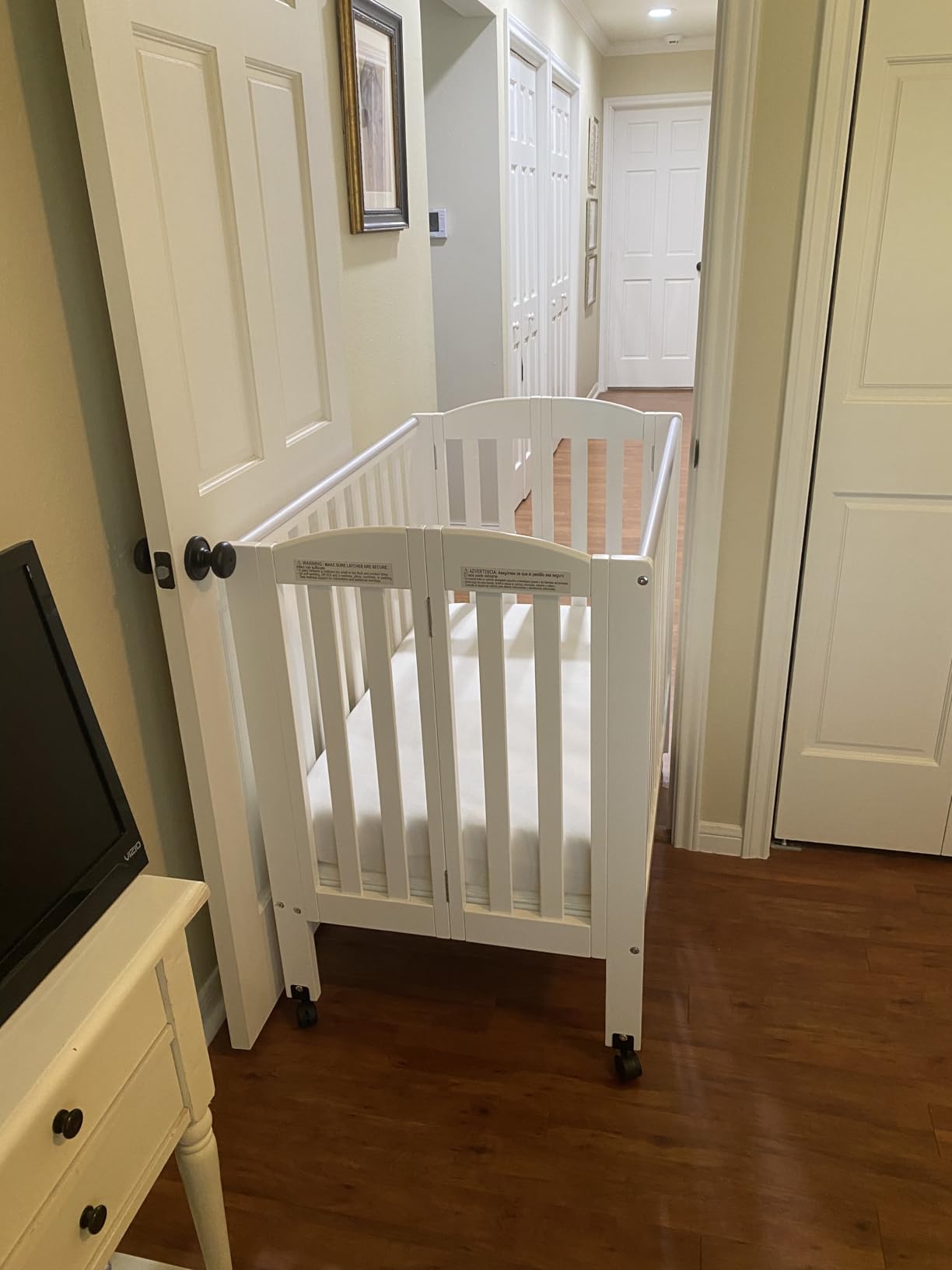 Dream On Me Mini Folding 3-in-1 Portable Baby Crib, Sturdy Locking Wheels | Mattress Included, 3 Adjustable Height, Compact Flat Fold for Small Spaces, GREENGUARD Gold & BSA Verified, White customer photo 2