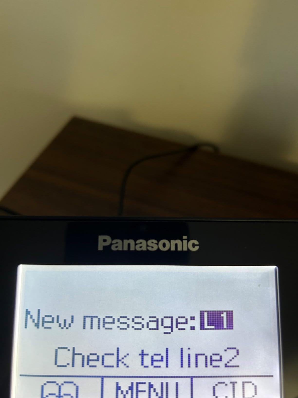 Panasonic 2-Line Corded Phone/Cordless Phone System with 2 Handsets - Answering Machine, Link2Cell, 3-Way Conference, Call Block, Long Range DECT 6.0, Bluetooth - KX-TG9582B (Black) customer photo 1