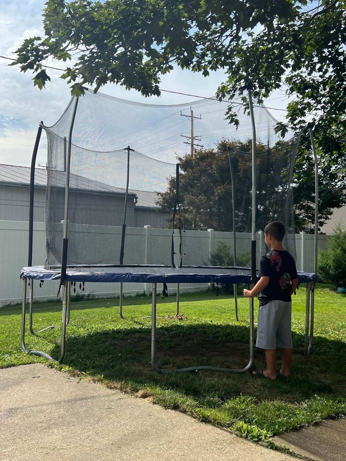 Skywalker Trampoline Outdoor 8 Ft, 12 Ft, 15 Ft Jump N' Dunk Round Outdoor Trampoline with Net, Trampoline Mat, and Basketball Hoop customer photo 2