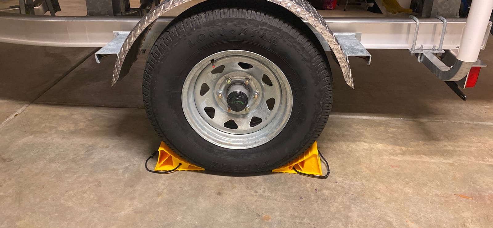 Camco RV Wheel Chocks with Rope - 2-Pack - Made in the USA | Keeps Trailer in-Place to Safely Unhitch - Compatible w/ Wheels Up to 26