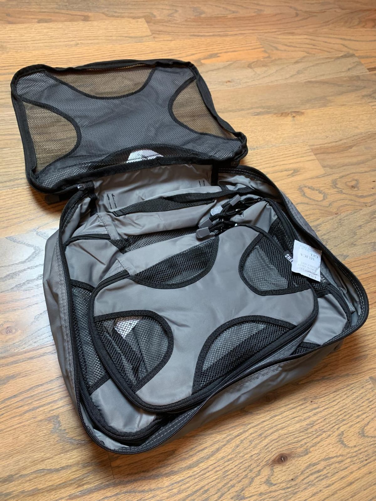 Shacke 5 Set Packing Cubes for Travel with Laundry Bag (Pure Black) | Suitcase Organizer Bags Set: 4 Water-Resistant Luggage Cubes, XL to Small, + Laundry Bag for Carry-On or Checked customer photo 2