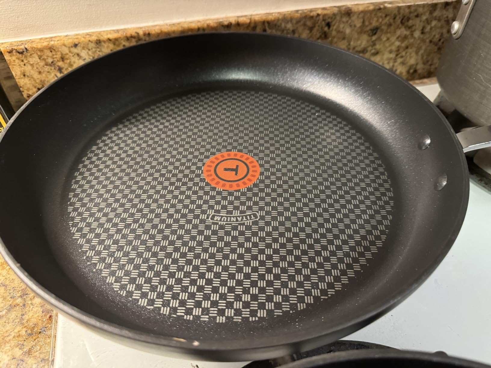 T-fal Ultimate Hard Anodized Nonstick Fry Pan Set, 2-Pack, 10,12 in, Onyx | Titanium nonstick coating, Thermo-Spot heat indicator, Oven safe to 400°F, Dishwasher safe, All stovetops except induction customer photo 1
