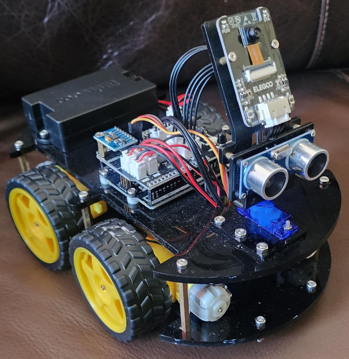 ELEGOO UNO R3 Smart Robot Car Kit V4 with Camera, Compatible with Arduino IDE, FPV Video, Line Tracking, Obstacle Avoidance, Auto Follow, App & IR Control, Class STEM Building & Coding Kit, Gift for 12+ customer photo 1