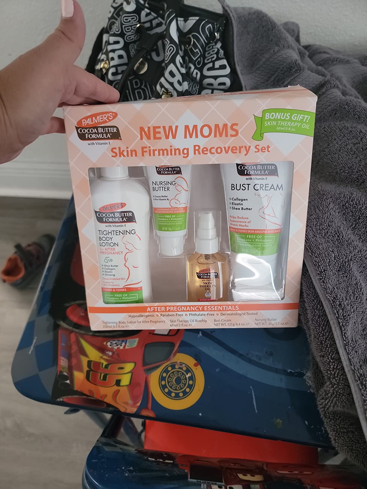 Palmer's Postpartum Essentials Cocoa Butter Formula Skin Care Kit (4 Piece) | Includes Firming Lotion, Nursing Butter, Bust Cream & Skin Therapy Oil. The ideal dermatologist-approved gift for new moms customer photo 2