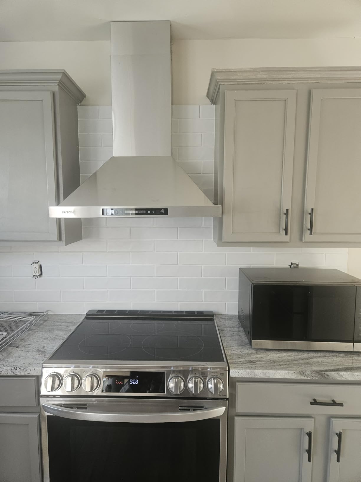IKTCH 30-inch Wall Mount Range Hood 900 CFM Ducted/Ductless Convertible, Kitchen Chimney Vent Stainless Steel with Gesture Sensing & Touch Control Switch Panel (IKP02-30) customer photo 1