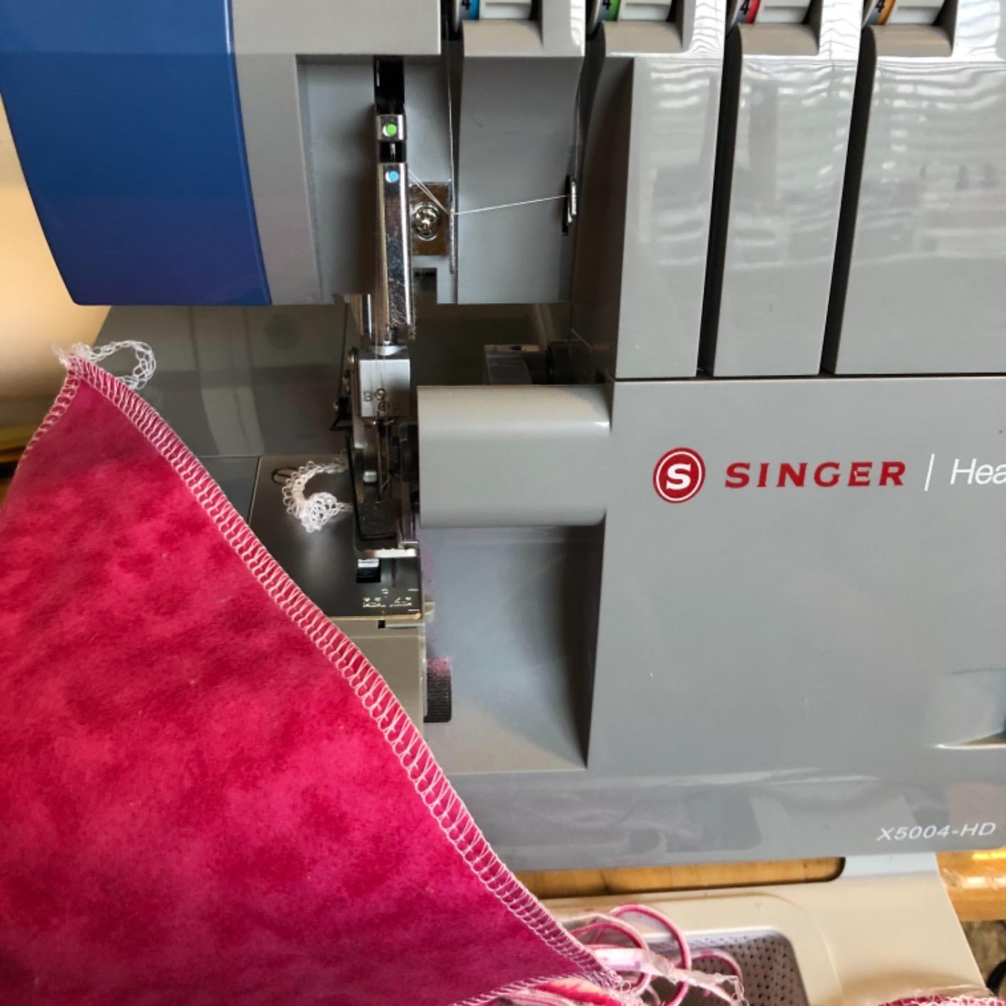 SINGER X5004-HD Serger Overlock Machine, 2-3-4 Thread Capability | 8 stitches, metal frame, color coded threading, adjustable differential feed, dual LED lights, 1300 stitches/min customer photo 2