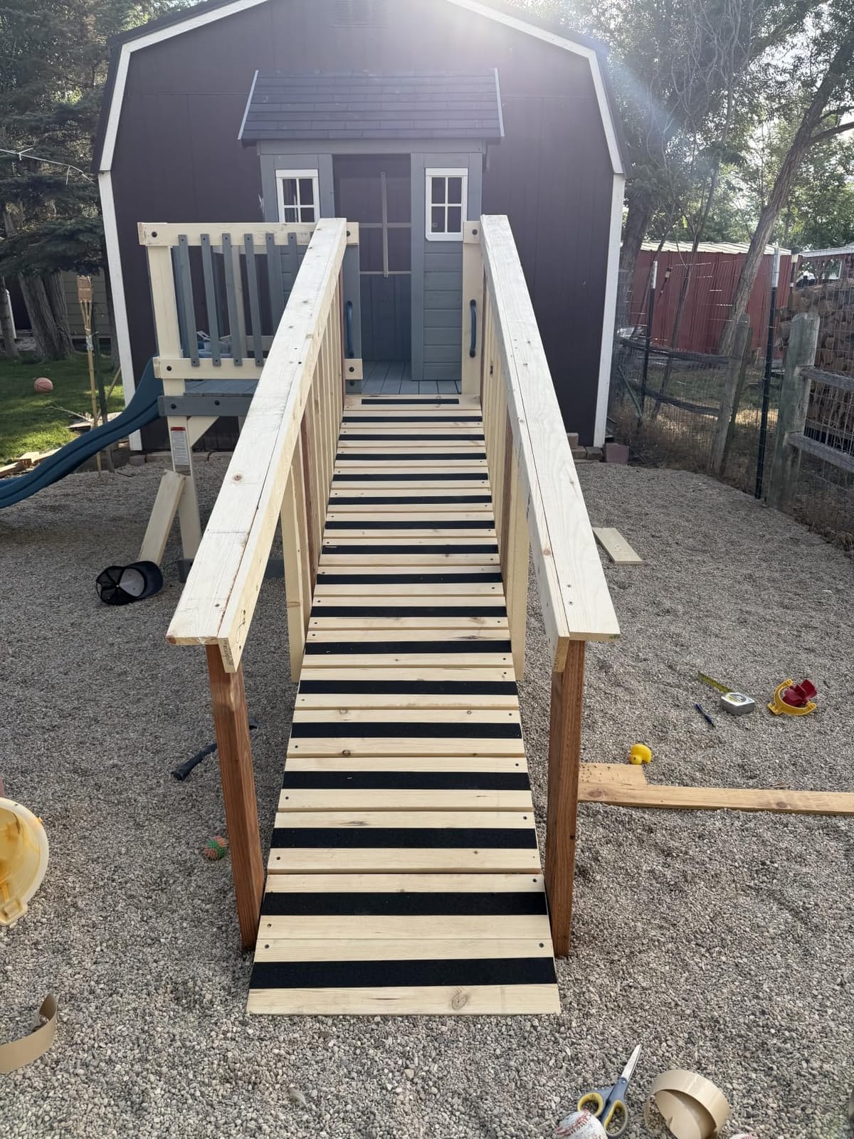 Backyard Discovery Echo Heights Elevated Cedar Wooden Kids Playhouse with Wave Slide, Play Kitchen, Wrap-Around Deck, Flat-Step Ladder, Half Door, Windows, Bell, and Growth Chart for Outdoor Play customer photo 2