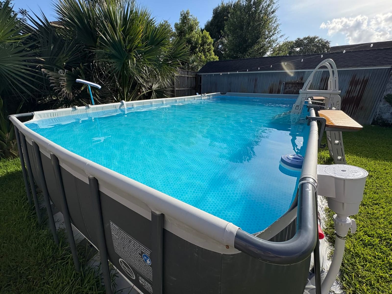 INTEX Ultra XTR 18ft x 9ft x 52in Above Ground Swimming Pool Set Bundle | 26355EH - 1500 GPH Sand Filter Pump, Ladder, Pool Cover & Ground Cloth with Sunshade Canopy Included customer photo 1