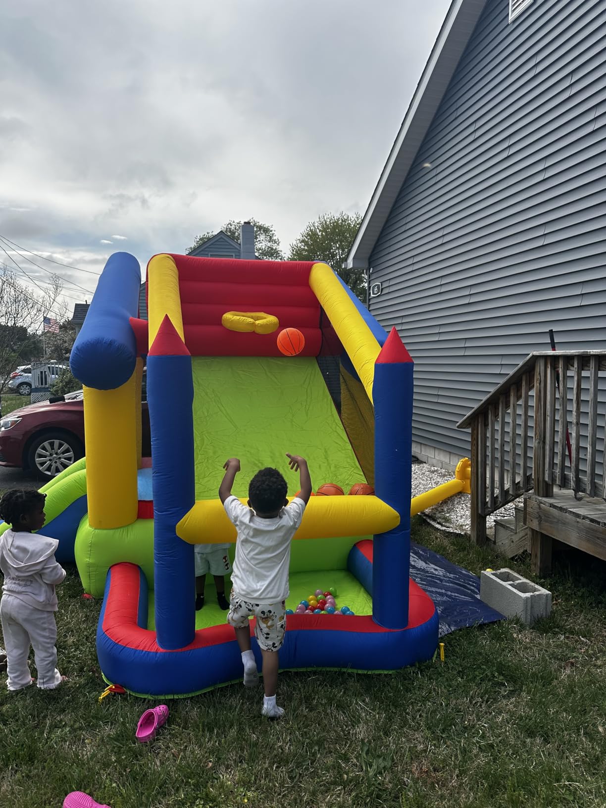 WELLFUNTIME Inflatable Bounce House with Slide, Bouncy Castle & Jumping Castle with Blower, Ball Pool, Basketball Game & Dart Target Game customer photo 1