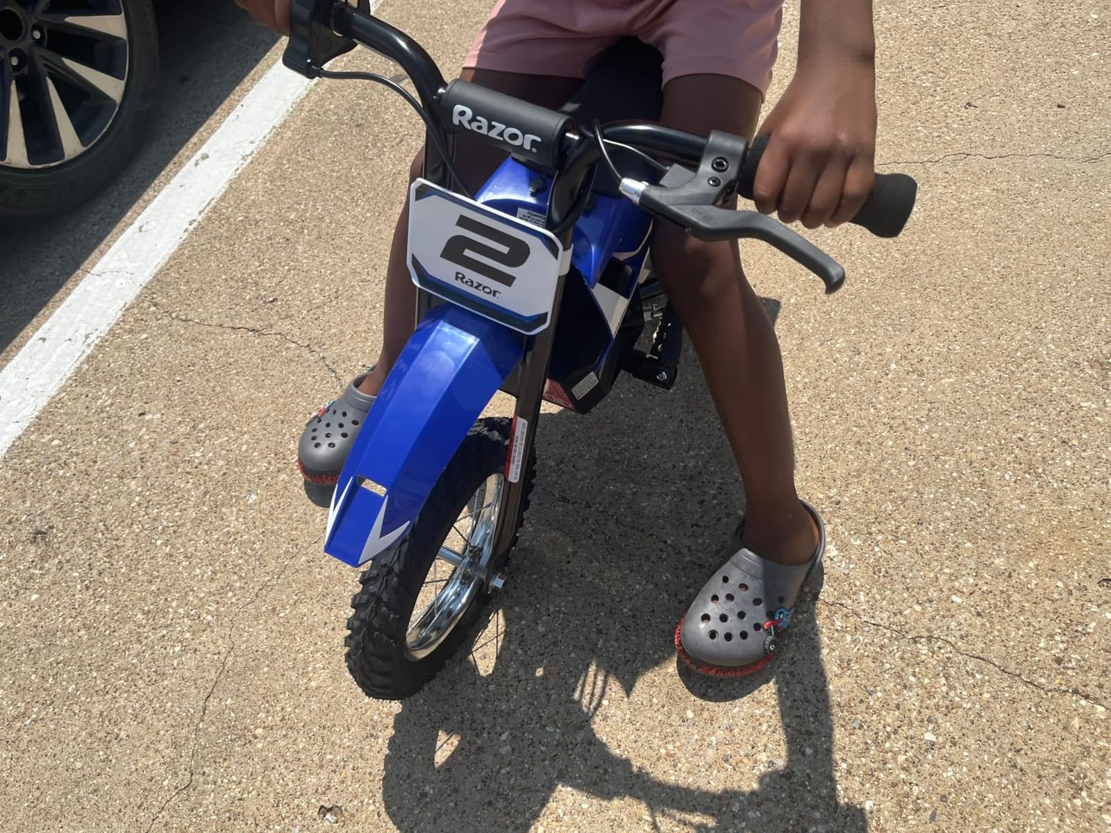 Razor MX125 Dirt Rocket Electric-Powered Bike with Authentic Motocross Geometry, Rear-Wheel Drive, 100-watt, High-Torque, Chain-Driven Motor, for Kids 7+, Blue customer photo 2