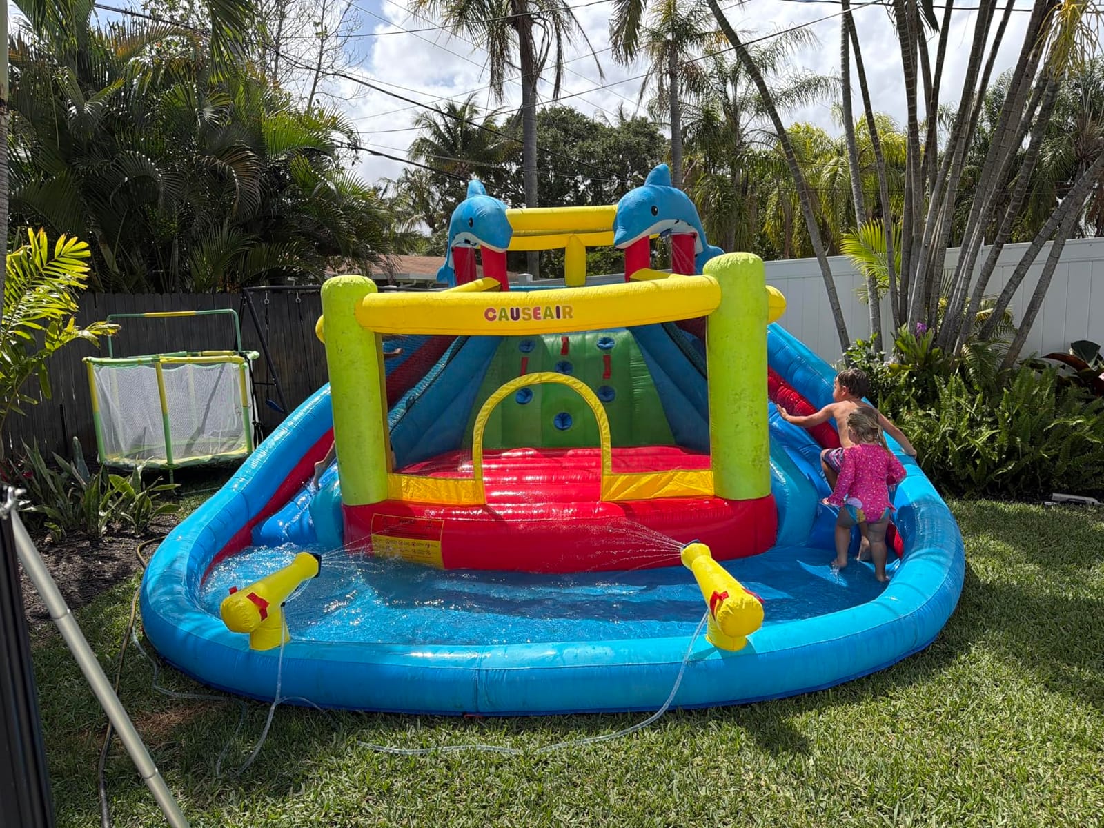 Causeair Inflatable Water Slide with Bounce House, Dolphin Styling, Splashing Pool, Double Water Cannon, Climbing Wall, Heavy Duty GFCI Blower, Inflatable Water Park Slide for Kids Backyard Summer customer photo 1