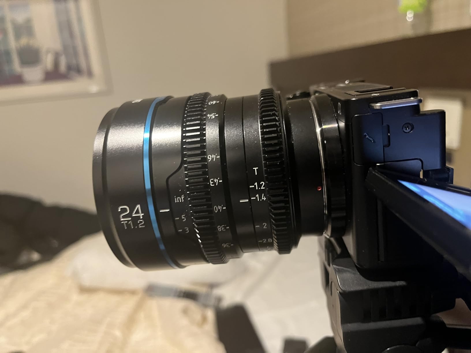 SIRUI Night Walker 24mm S35 Manual Focus Cine Lens, T1.2 Large Aperture Lens for E Mount Cameras, FX30, ZVE-10, A6500, A6600 (Metal Grey) customer photo 1