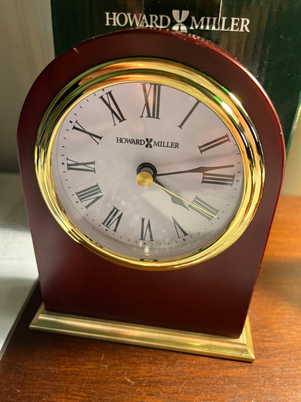 Howard Miller Priest River Table Clock II 549-779 - Modern Arched Shaped Clock II, Low-Gloss Rosewood Hall Finish, Brass Finish Metal Base, Felt Bottom, Quartz Movement customer photo 1