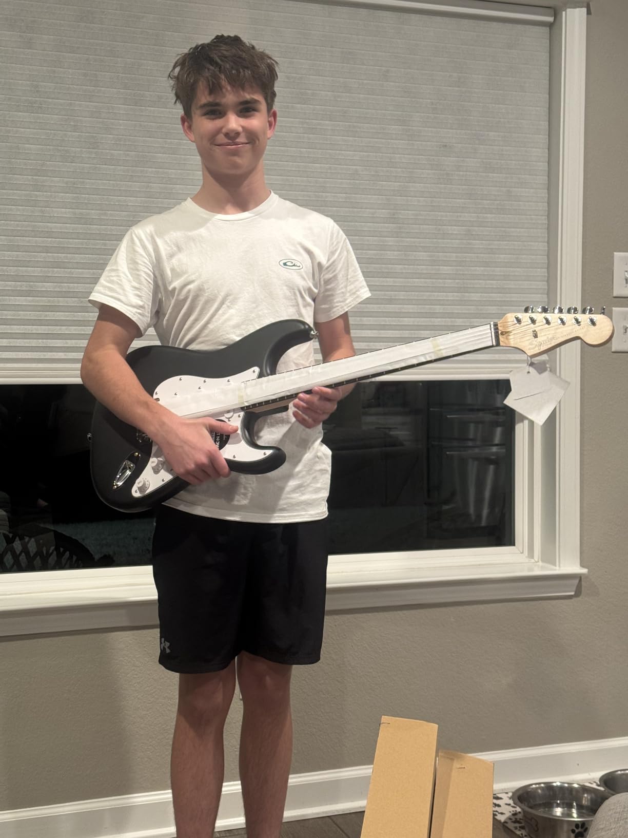 Fender Squier Debut Stratocaster Beginner Electric Guitar Kit, Matte Black | Complete starter pack with Frontman 10G amp, padded gig bag, strap, free lessons, 2-year warranty included customer photo 2