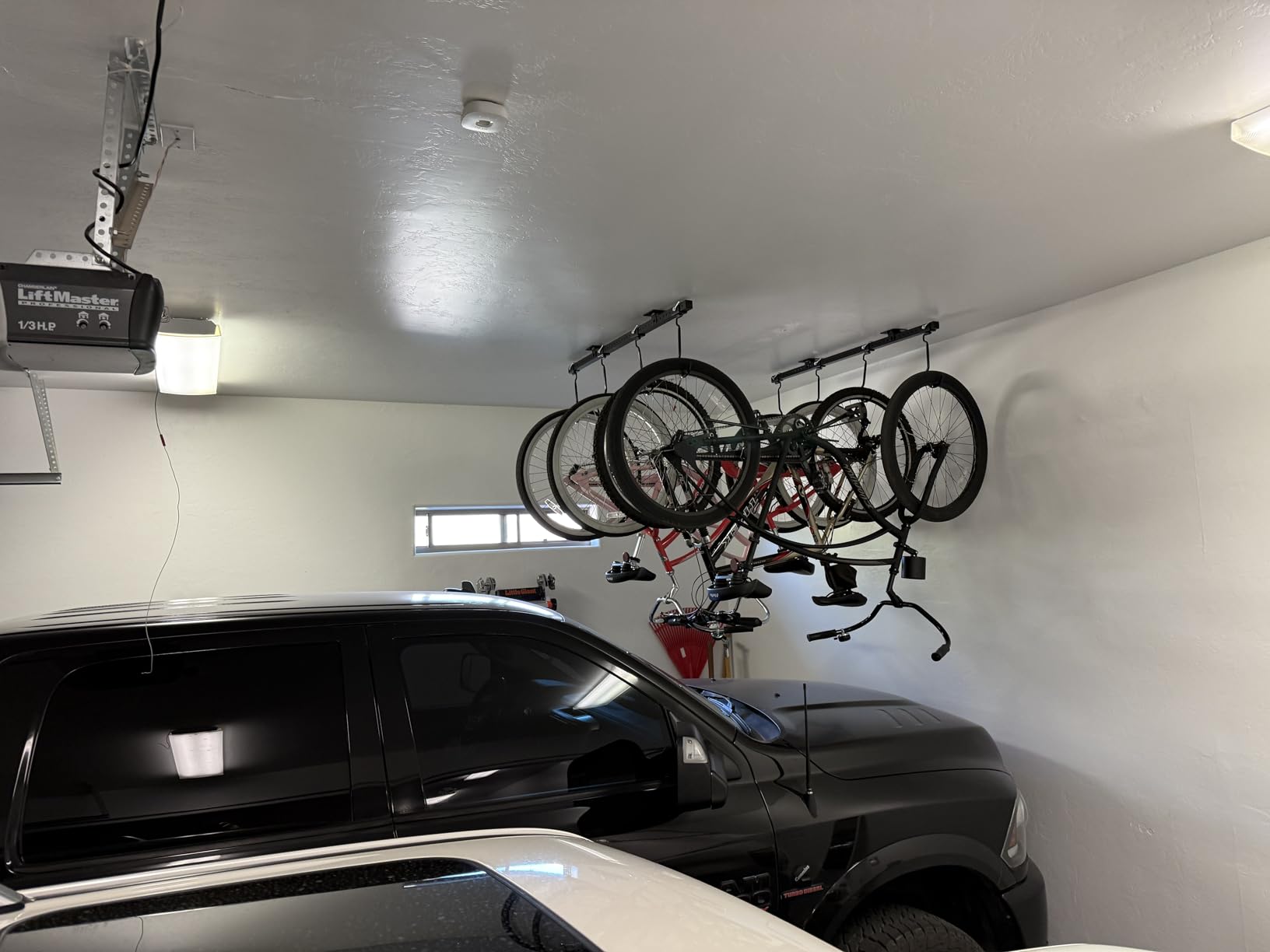 Teal Triangle Adjustable Ceiling Mounted Bike Rack for Garage, Hold 8 Bikes | Ceiling Bike Hanger, Hanging Bike Rack for Garage, Rubber Coated Hooks, Holds 8 Bikes customer photo 1
