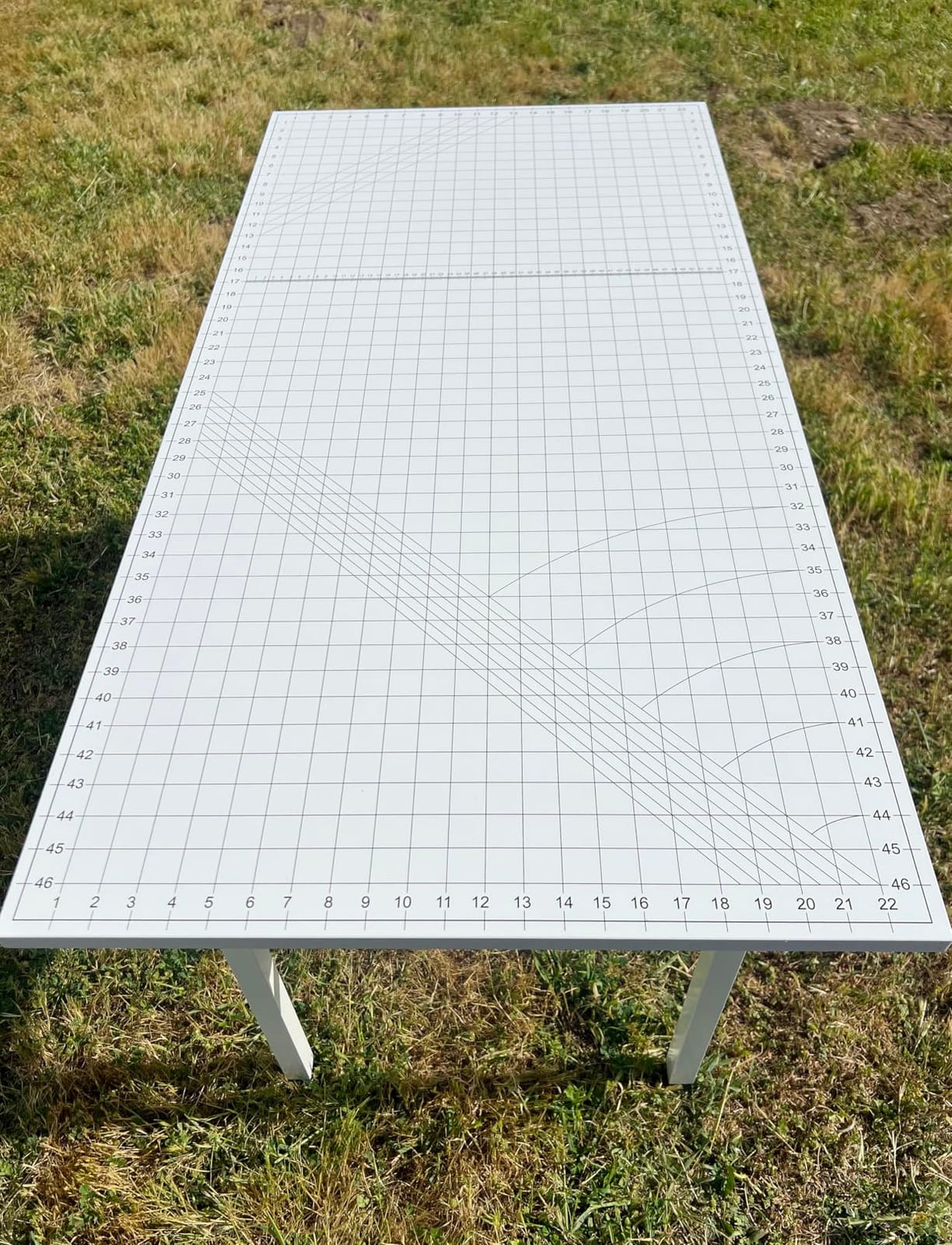 Crutello Fabric Cutting & Sewing Table, 48x24 Inch - Grid Top with Storage | Steel Folding Storage Legs, For Sewing Machine, Hobby & Crafting Room, Grid Top Surface for Fabric Cutting customer photo 1