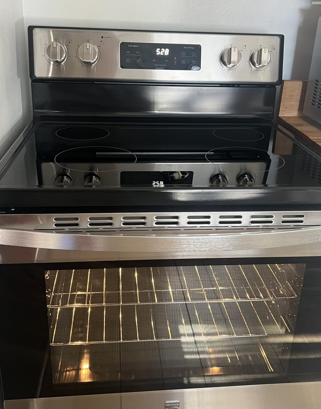 Kenmore 5.2 cu ft. Rear Control Electric Range - 4 Cooktop Elements - Steam Clean Oven & Hidden Bake for Easy Cleaning - Ultra-Durable Chrome Racks & Storage Drawer - White customer photo 2