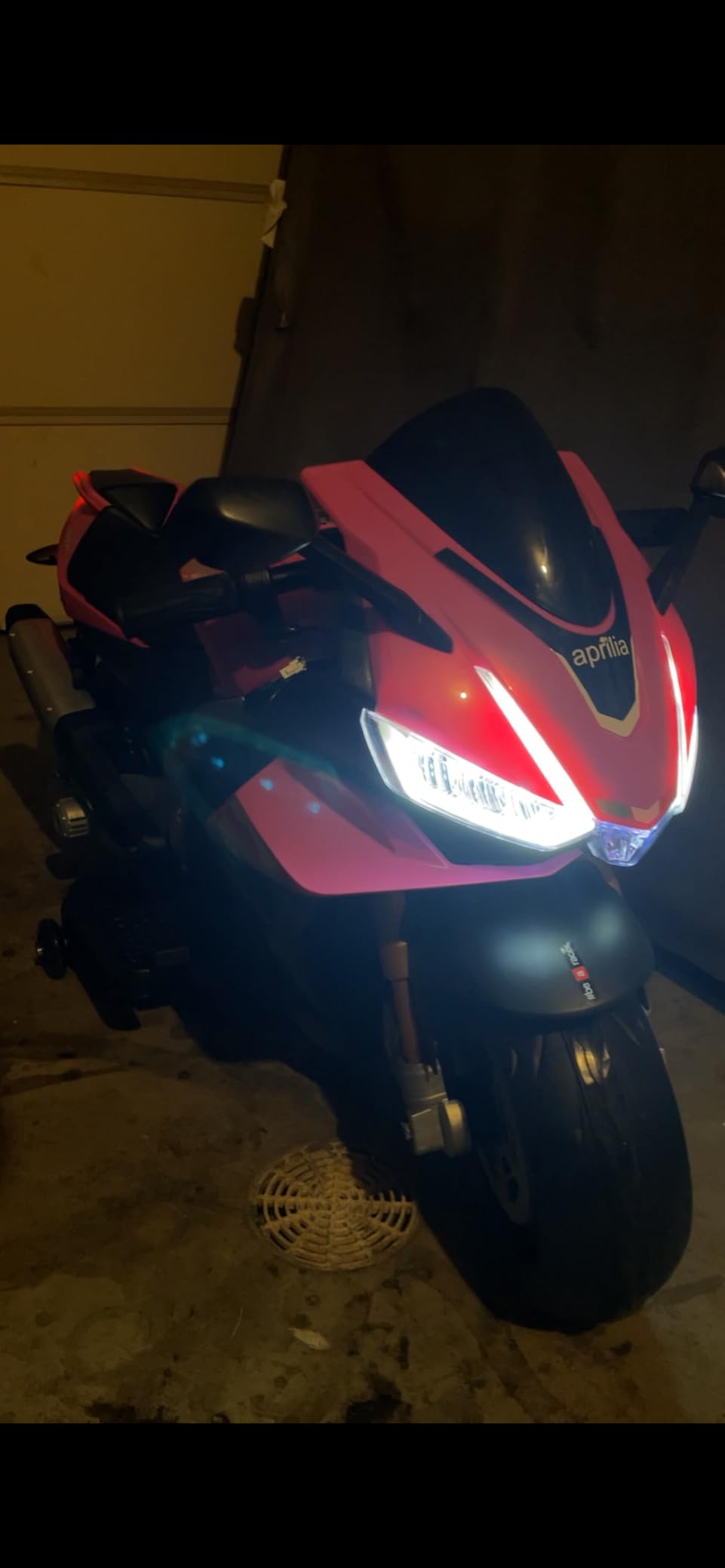 TCARAIWEN 24V Electric Motorcycle for Kids, Ride On Toys for 4-10 Years Old | Aprilia Licensed Motor Bike, Speed Up to 8mph, Training Wheels, Bluetooth and Mp3, Toddler Motorcycle for Girls Boys, Black customer photo 2