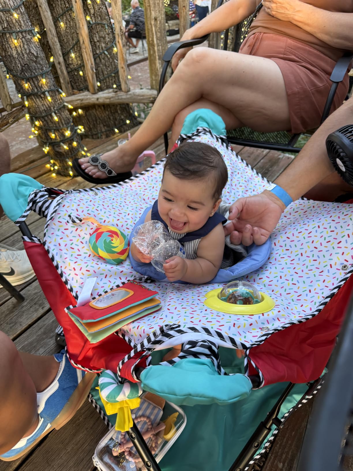 Bright Starts Pop 'N Jump Portable Baby Jumper, Foldable Indoor/Outdoor Baby Jumper with Sweet Treats with Sensory Activities, Ages 6-12 Months customer photo 2