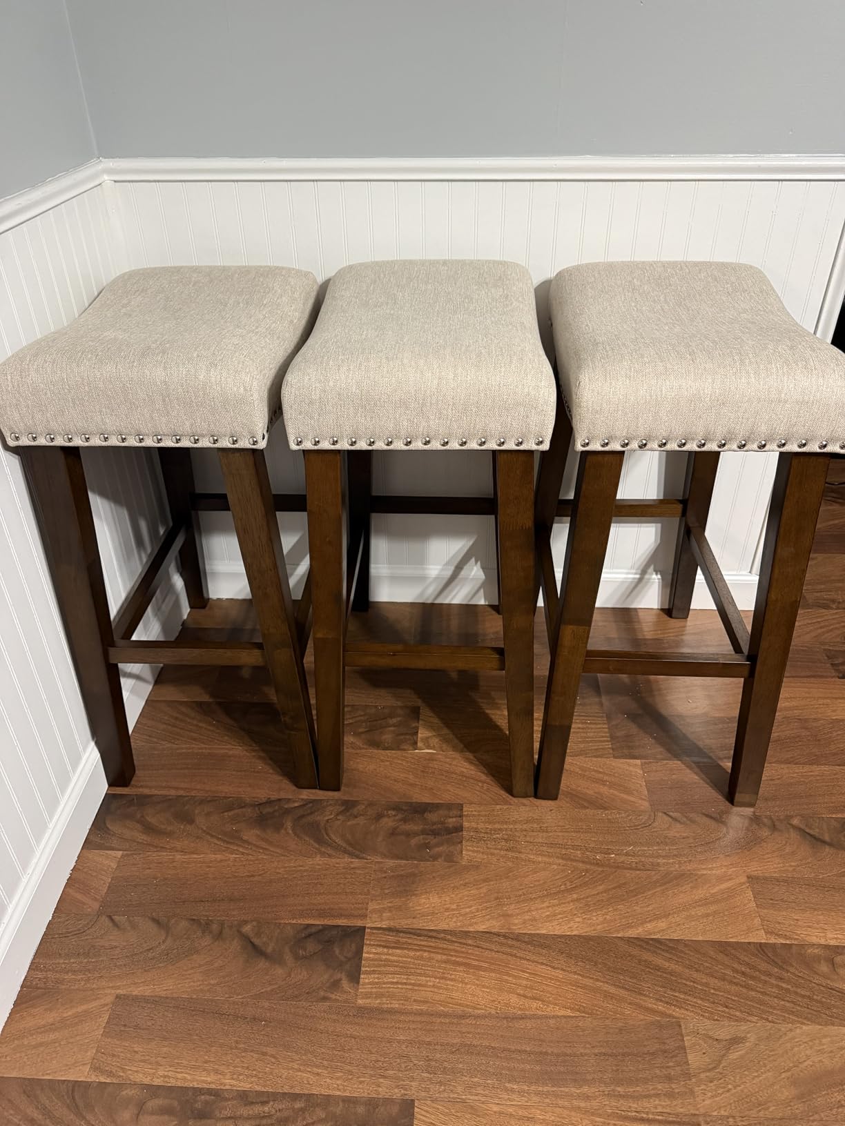 PrimeZone 26 Inch Solid Wood Saddle Backless Bar Stools Set of 2, Beige | Counter Height Barstools with Footrest & Nailhead Trim, Modern Farmhouse Upholstered Linen Counter Stools for Kitchen Island customer photo 1