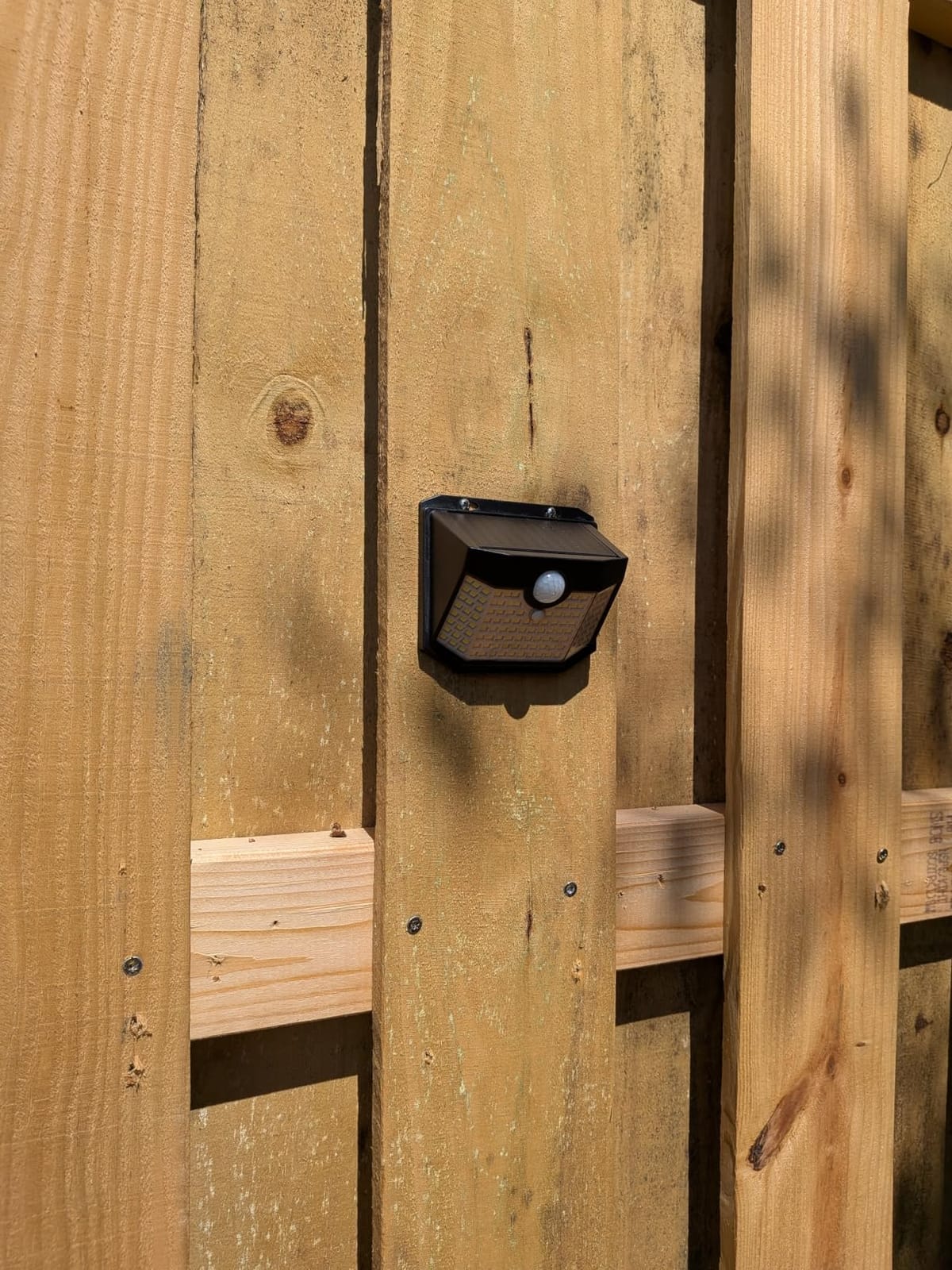 HMCITY 120 LED Outdoor Solar Lights with Motion Sensor and 3 Lighting Modes, IP65 Waterproof Wide Solar Wall Lights Ideal for Garden Patio Yard (Front Button 6Packs, Black Shell-Daylight White) customer photo 1