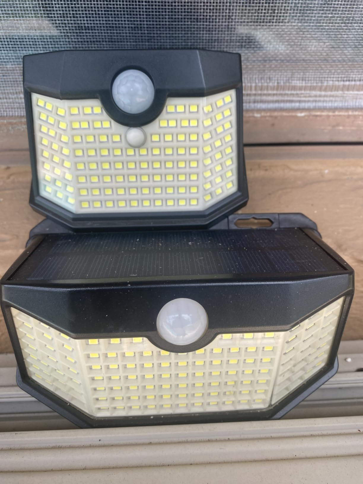 HMCITY 120 LED Outdoor Solar Lights with Motion Sensor and 3 Lighting Modes, IP65 Waterproof Wide Solar Wall Lights Ideal for Garden Patio Yard (Front Button 6Packs, Black Shell-Daylight White) customer photo 2