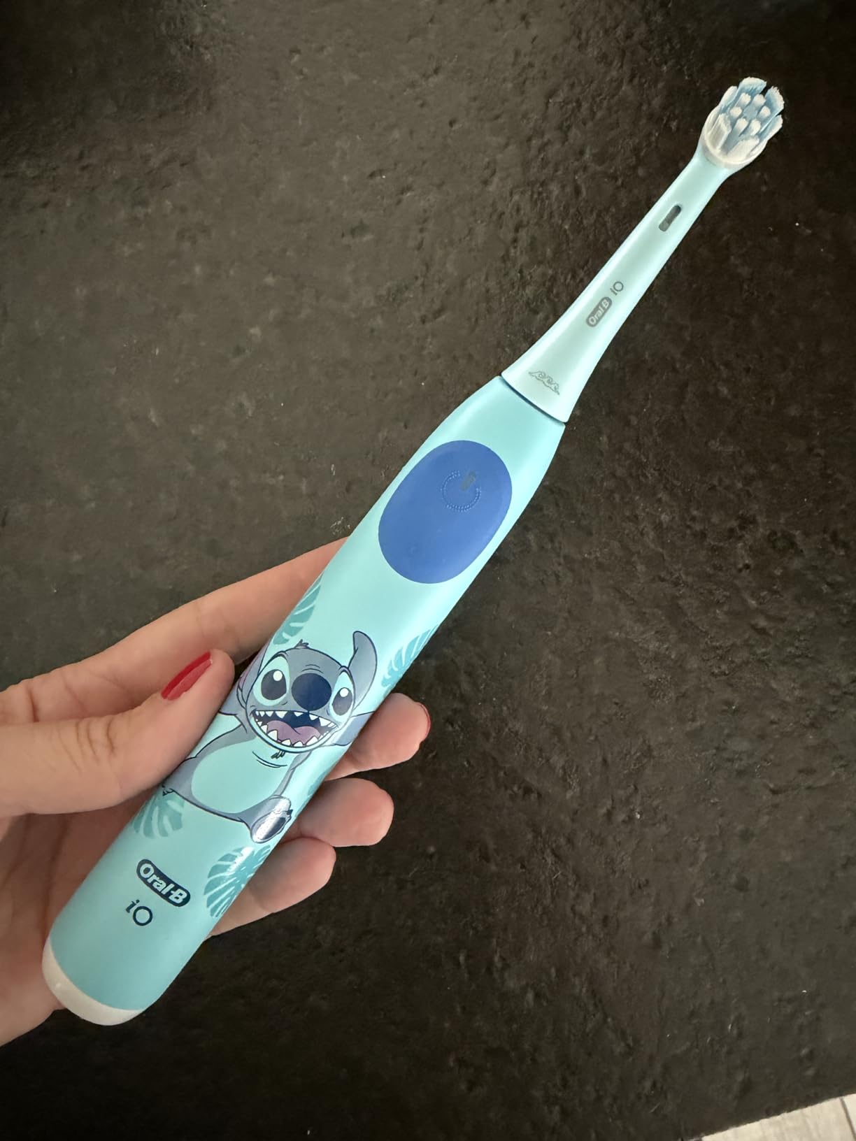 Oral-B iO Kids Limited Rechargeable Electric Powered Toothbrush, Stitch - Automatic Pressure Sensor - 3 Cleaning Settings - Music Timer - 28 Day Battery Life - Travel Case customer photo 1
