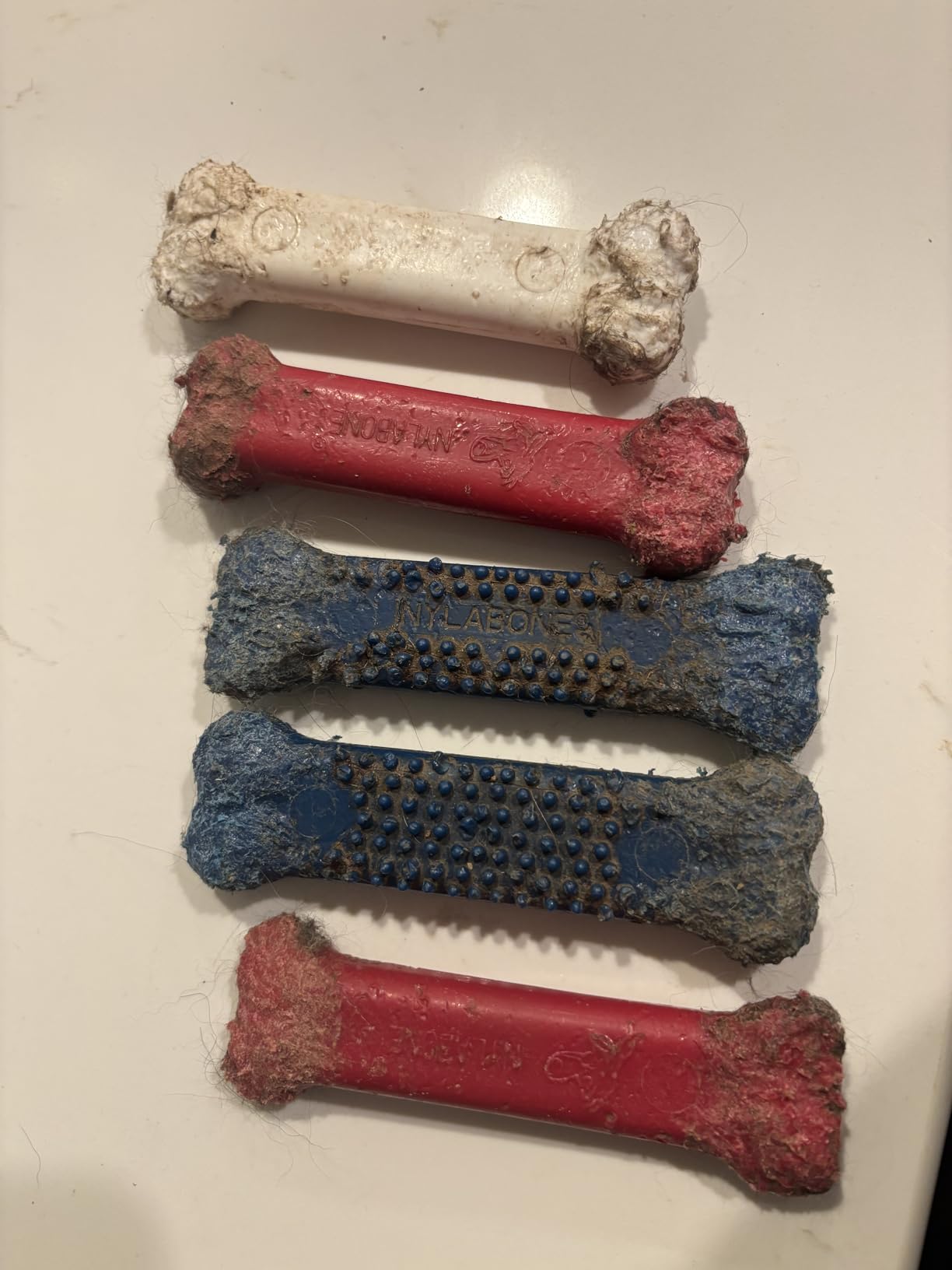 Nylabone Power Chew Textured Bone Dog Chew Toy, Original Flavor, X-Large | Durable dog toys, long lasting, discourages destructive chewing, teeth-cleaning textures, flavor throughout, for dogs 50+ lbs customer photo 2