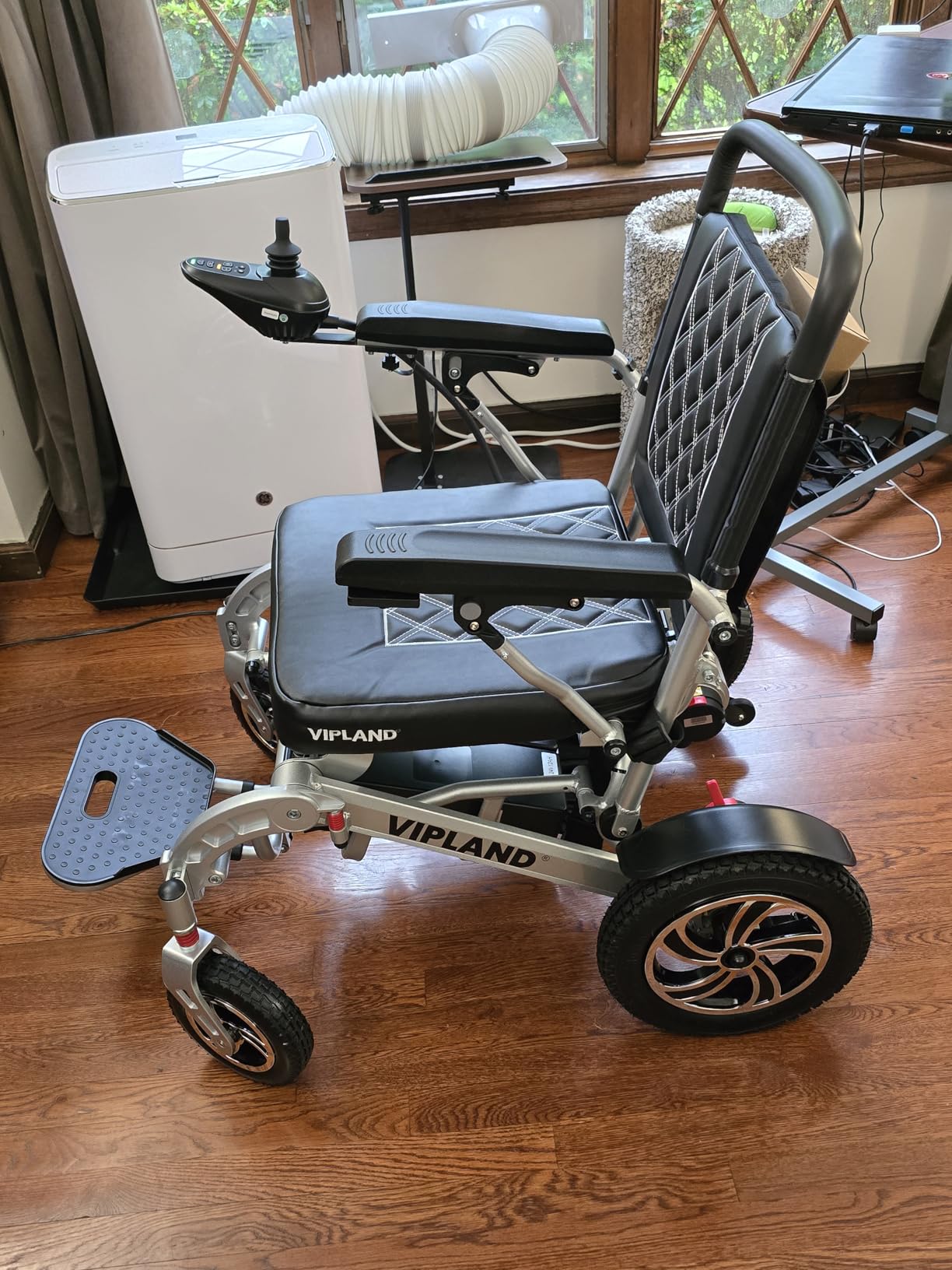 350 lbs Capacity 30 Miles Long Range Electric Wheelchair for Adults | All Terrain, Leather Seat, 8 Shock Absorbing Spring, Retractable Footrest, Cup Holder, LED Light, USB Port, Remote Control customer photo 1