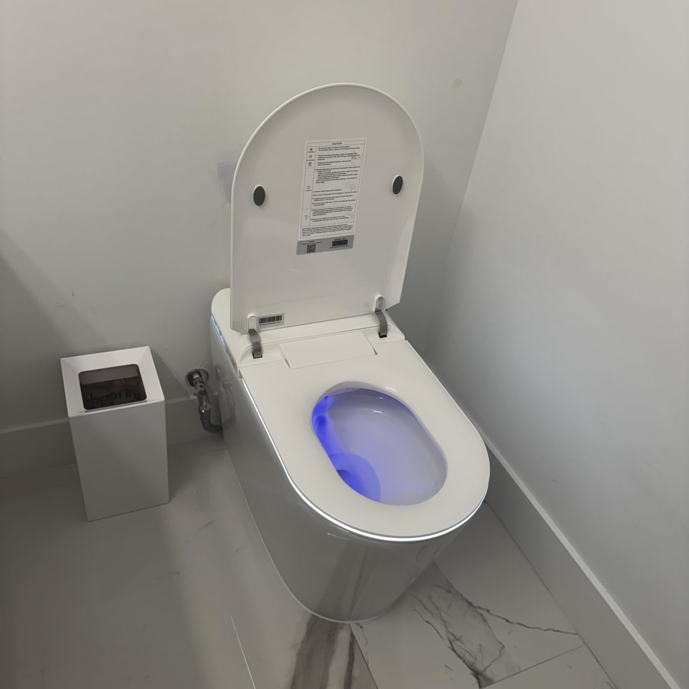 LOUPUSUO Luxury Smart Toilet with Warm Water Sprayer and Dryer | Auto-Open/Close Lid Heated Seat for Bathrooms, Multiple Cleaning Modes, Air Purification, Foot Sensor (WHITE 15 PROMAX) customer photo 1